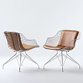 Two Modern Leisure Chairs With Metal Wire Frame And Brown Leather Seats