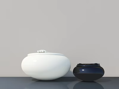 White And Black Ceramic Decorative Ornament Set With Round Shaped Design On Gray Tabletop 3d model