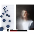 Wall Art with Blue Dots on Lined Paper and Blurred Person in White Shirt