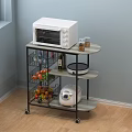 Kitchen Rolling Cart With Microwave Bottles Fruits And Rice Cooker
