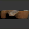 Glossy Orange Aquatic Animal Shell With Unique Curved Shape And Smooth Textured Surface