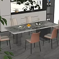 Modern Dining Room With Marble Table Chairs Fruits Tableware And Green Plants