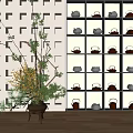 Teaware Displayed On Transparent Grid Shelf With Multiple Teapots And Plant