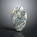 Natural Stone Artisan Piece With Smooth Teardrop Shape And Unique Gray Brown Texture