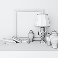 Decorative Ornament Set With Golden Framed Mirror Table Lamp Blue White Vases And Stacked Books