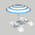 Outdoor Lounge Chairs with Blue and White Striped Umbrella and Side Table