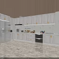 Modern Kitchen Interior With White Cabinets Gold Handles And Marble Countertops