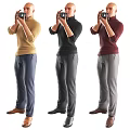 Three People Taking Photos With Cameras In Different Colored Turtleneck Sweaters And Pants