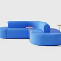 Blue Curved Public Chair With Modular Design And Orange Circular Accents
