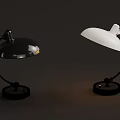 Stylish Black And White Table Lamps With Curved Arm And Round Shade Design