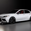Sleek White Modern Sedan With Black Wheels And Red Interior Seats