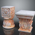 Ornate Stone Columns With Intricate Carved Floral Patterns And Lion Head Designs