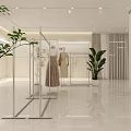 Modern Clothing Store Interior With Beige Dress Mannequin Leather Handbags Green Plants And Pendant Lights