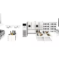 Modern White Kitchen Interior With Essential Appliances Stove Refrigerator And Island