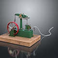 Mechanical Model of Spacecraft Propulsion Mechanism With Green Body Red Wheel and Wooden Base