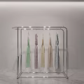 Modern Transparent Metal Clothes Hanger With Various Colored Dresses LED Lighting And Marble Floor