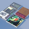 Diverse Collection of Books and Magazines with Artistic Covers and Colorful Designs