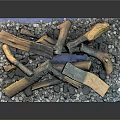 Natural Wood Logs And Gray Stone Chips Arranged On Blue Mat For Decorative