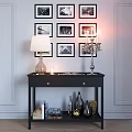 Decorative Accessories Set On Black Console Table With Lamp Candelabra And Picture Frames 3d model