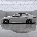 White Sporty Sedan Parked In Indoor Space With Reflective Floor Gray Walls And Grid Ceiling