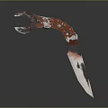 Decorative Metallic Knife With Red Chain Handle And Sharp Blade Design
