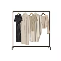 Trendy Clothes On Metal Rack Featuring Striped Dress Coat And Neutral Shirts