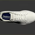 White Reebok Low Top Sneakers With Clean Simple Casual Footwear Design