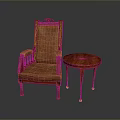 Brown Upholstered Armchair With Wooden Frame And Small Round Table