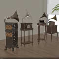 Vintage Gramophones With Horn Speakers On Wooden Floor Near Window With Plant