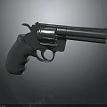 Metallic Revolver Handgun With Gray Grip And Dark Background Reflection