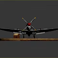 Camouflage Airplane Model With Red Propeller On Wooden Base And Wing Insignia