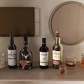Stylish Wine Bottles and Cocktail Glasses Display on Shelf with Golden Cabinet and Round Mirror
