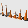 Various Sizes Of Orange Traffic Cones And Striped Warning Posts For Road Safety Equipment