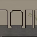 Wooden Frame Components on Light Colored Wall with Gray Tile Floor and Green Plant