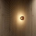 Elegant Modern Wall Lamp on Wooden Wall with Radiant Warm Light Effect
