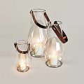 Transparent Glass Lanterns With Leather Handles And Lit Candles For Home Decor