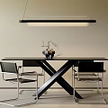 Sleek Black Dining Table Set With Crossed Legs Metal Frame Chairs And Hanging Pendant Light