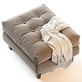 Cozy Taupe Ottoman With Tufted Cushion Soft Blanket And Wooden Legs