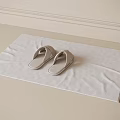 Cozy Beige Slippers Comfortable Indoor Shoes Placed On Light Towel Over Simple Floor Background