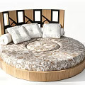 Modern Round Bed With Wooden Headboard Black Accents Patterned Bedspread And White Pillows