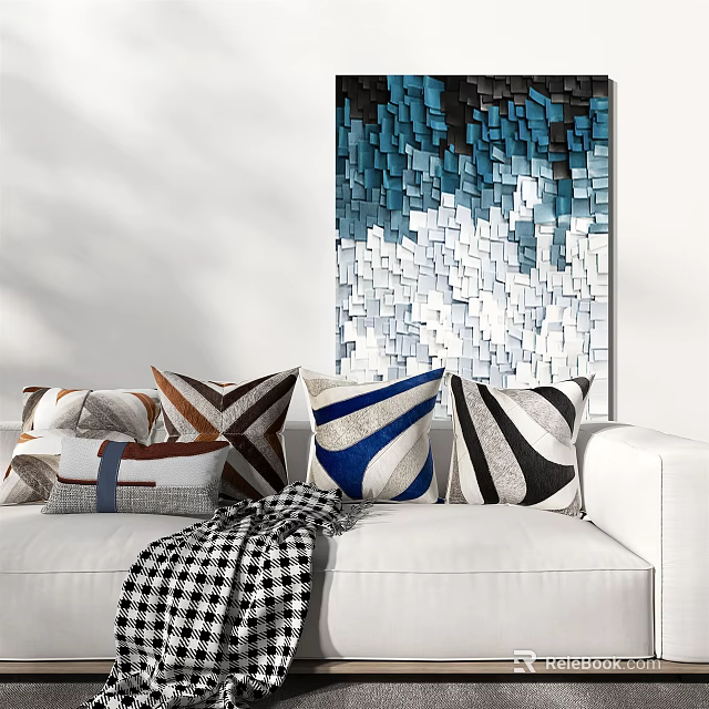 Decorative Accent Pillows with Geometric Patterns on White Sofa and Blue White Square Wall Art 3d model