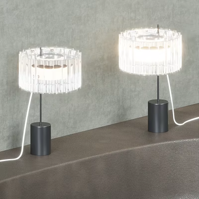 Two Modern Table Lamps With Transparent Crystal Shade And Black Base Illuminated On Table 3d model