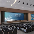 Spacious Conference Room With Large Screen Rows Of Seats And 40th Anniversary Decorative Posters