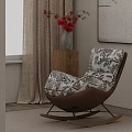 Stylish Patterned Rocking Accent Chair With Wooden Frame And Red Flower Vase Near Window