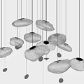 Irregular Shaped Glass Pendant Lights Hanging With Warm Yellow Glow For Modern Interior