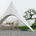 White Canvas Tent With Outdoor Dining Table And Chairs Near Pine Tree