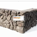 Building Exterior Wall Constructed With Natural Irregular Stones And Rough Texture