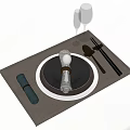 Tableware Set with Black and White Plate Chopsticks Napkin and Wine Glasses on Placemat