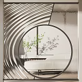 Modern Interior Partition With Stone Wall And Curved Metal Strips Near Sofa And Green Plant
