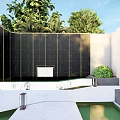 Modern Black Feature Wall With Golden Lines Surrounding Green Plants And Water Pool